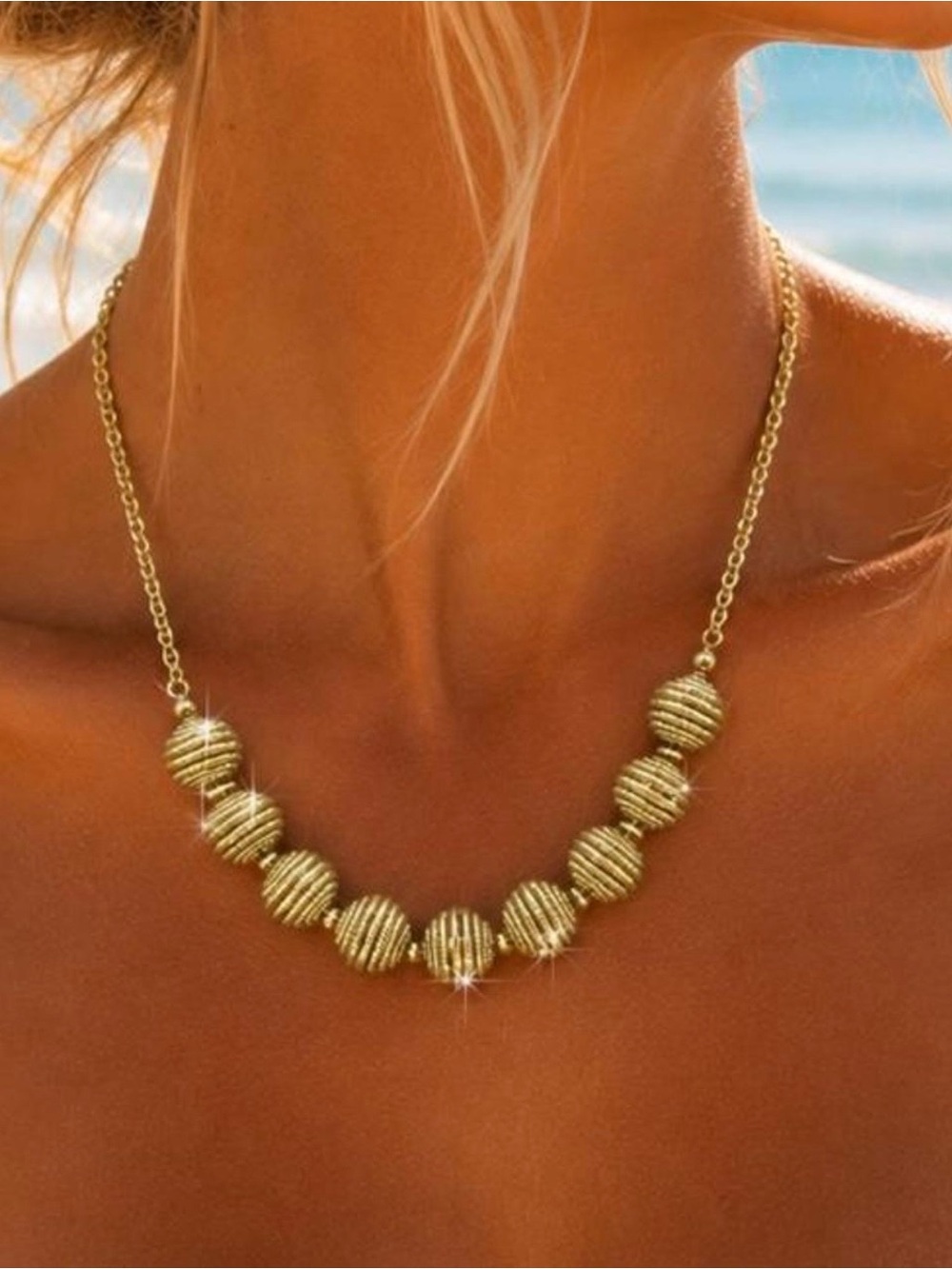 Vintage signed Monet Gold Tone Ribbed Coil Bead Statement Necklace